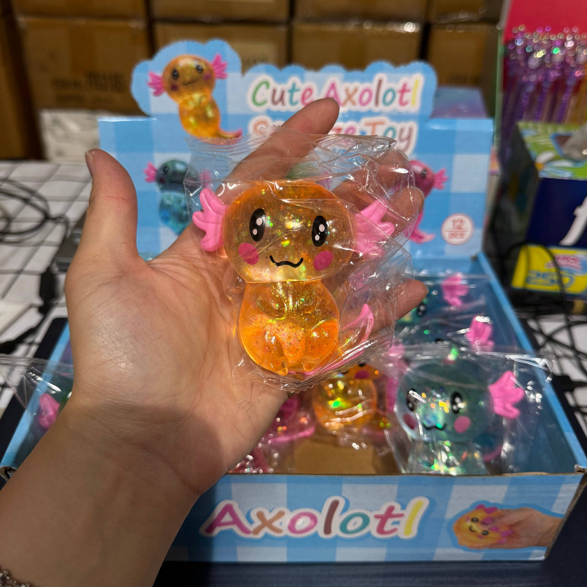 Sugar Squeeze Glitter Axolotl Toy