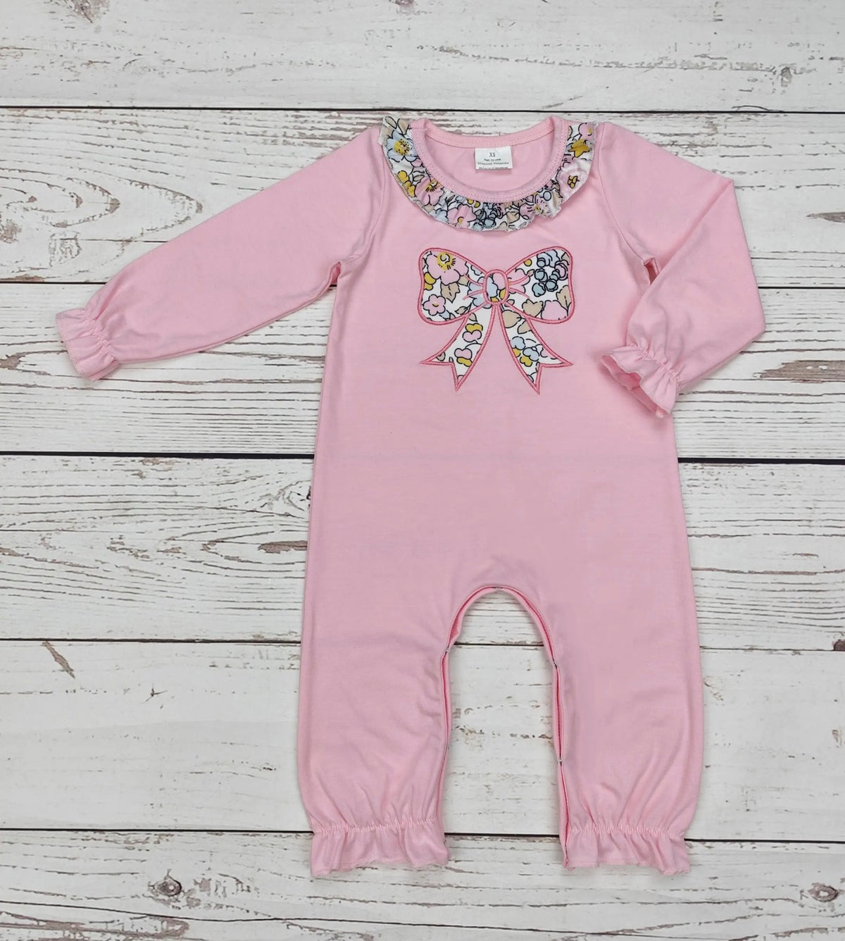 Pink bow romper